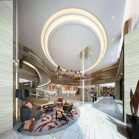 Отель Hilton Dili Palm Springs Интерьер фото